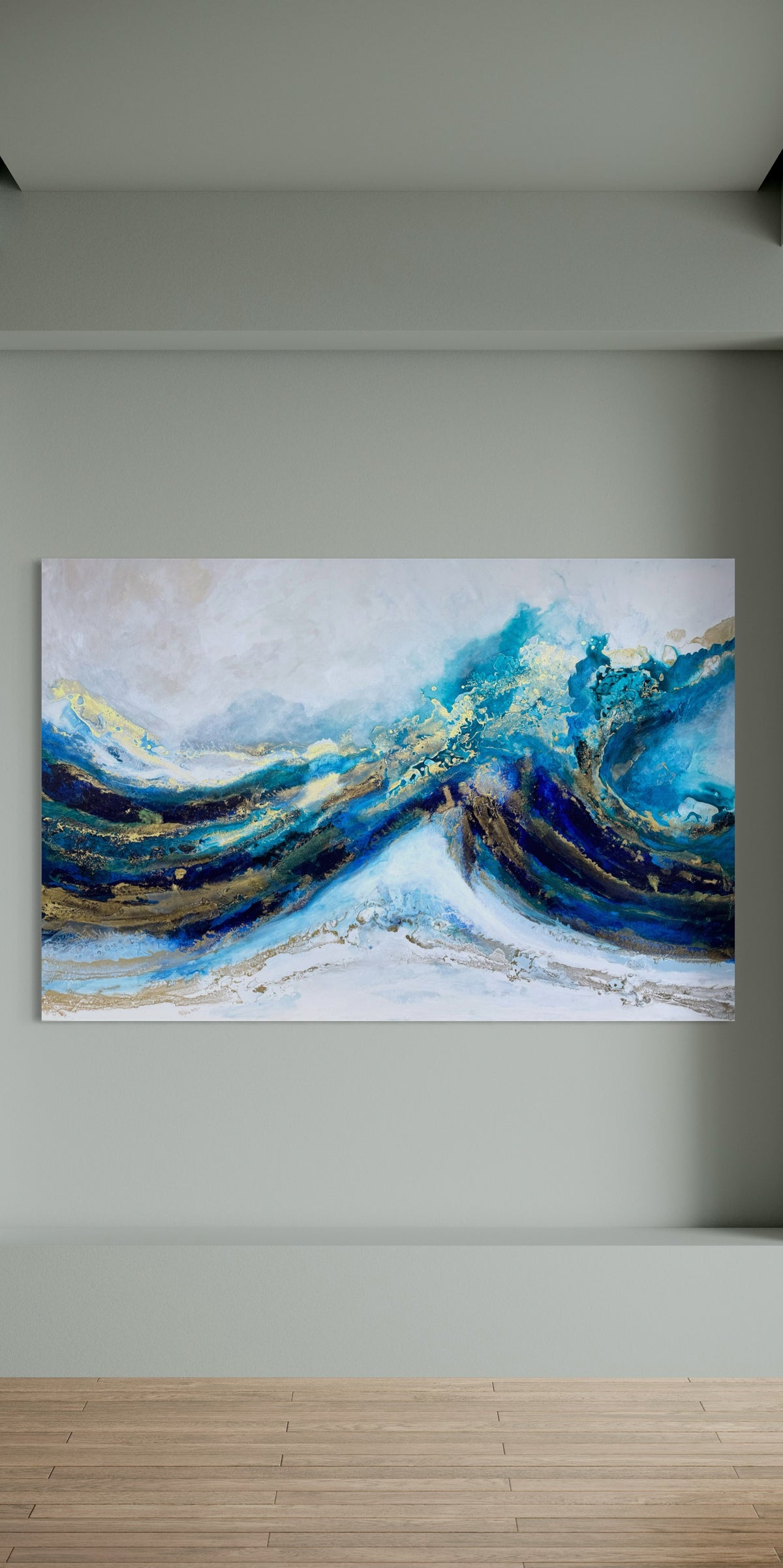 Blue, turquoise, white, and gold abstract painting displayed on a gray wall.